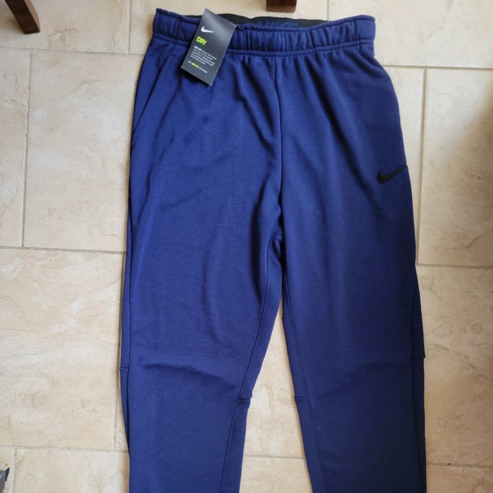 Mens Nike dri fit pants, size medium